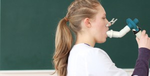 Profile of medical student doing spirometry test; education and health examination concept